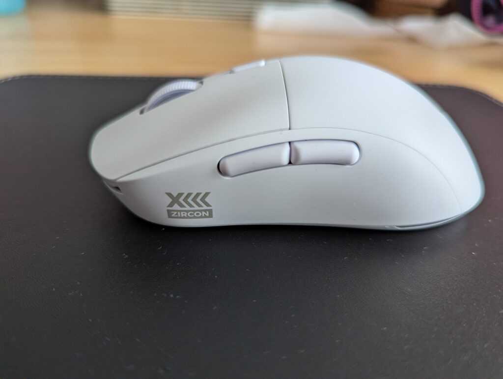 Side on view of the White Zircon XIII mouse